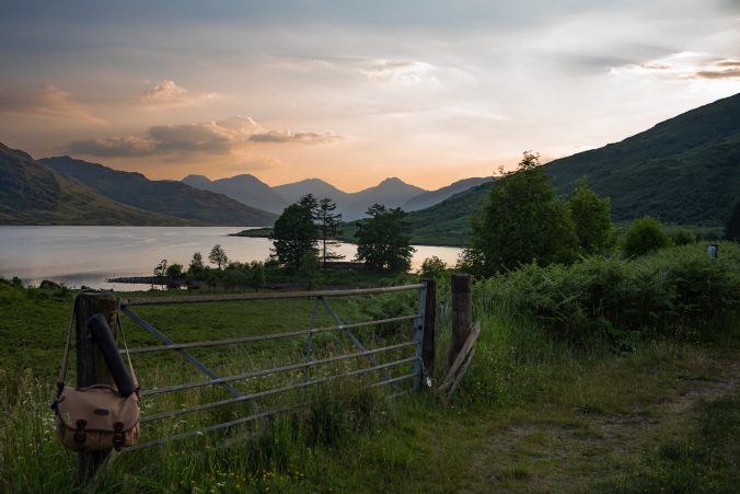 Landscape view of Glen Arklet, Strathard, looking west towards the sunset and the Arrochar Alps from the eastern end of Loch Arklet